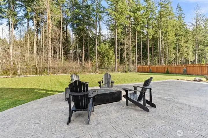 Friends and family will want to sit by the firepit on those long summer nights