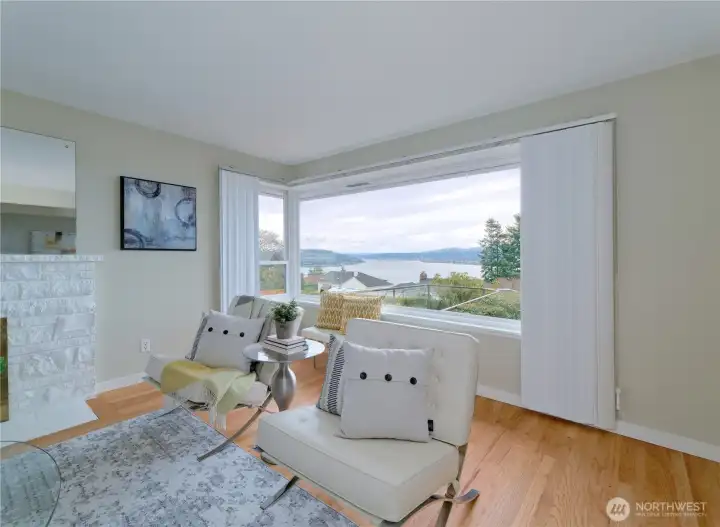 Main floor living room, hall and bedrooms with original oak hardwood floors.