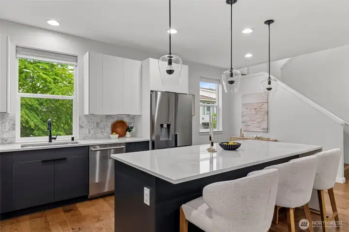 Unique Calacatta kitchen countertops and Maravilla Marble backsplash