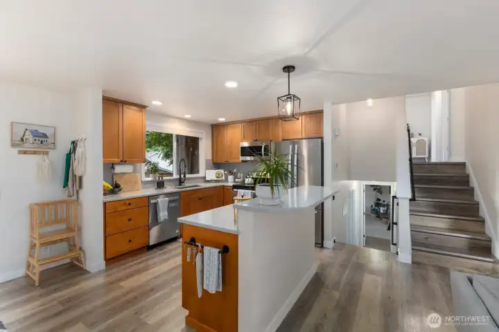 Kitchen has bar seating and easy entertainment possibilities Kitchen has bar seating and easy entertainment possibilities