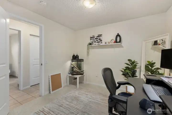 3rd bedroom is being used as an office space and sits on the lower level 3rd bedroom is being used as an office space and sits on the lower level