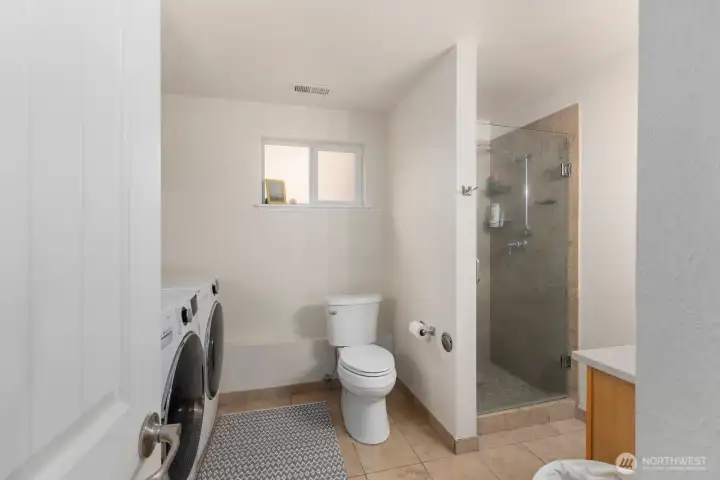Laundry and 3/4 bathroom is on the lower level Laundry and 3/4 bathroom is on the lower level