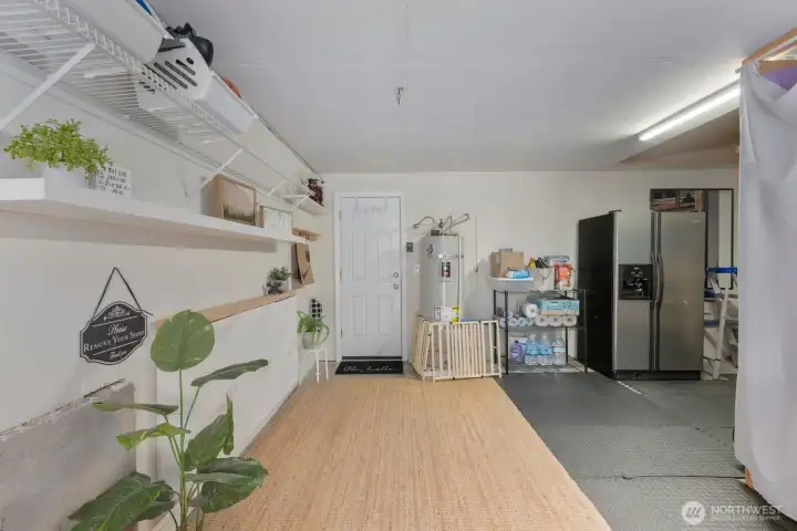Garage has a second fridge/freezer combo, is clean and partially finished. Lots of storage opportunities in this space! Garage has a second fridge/freezer combo, is clean and partially finished. Lots of storage opportunities in this space!