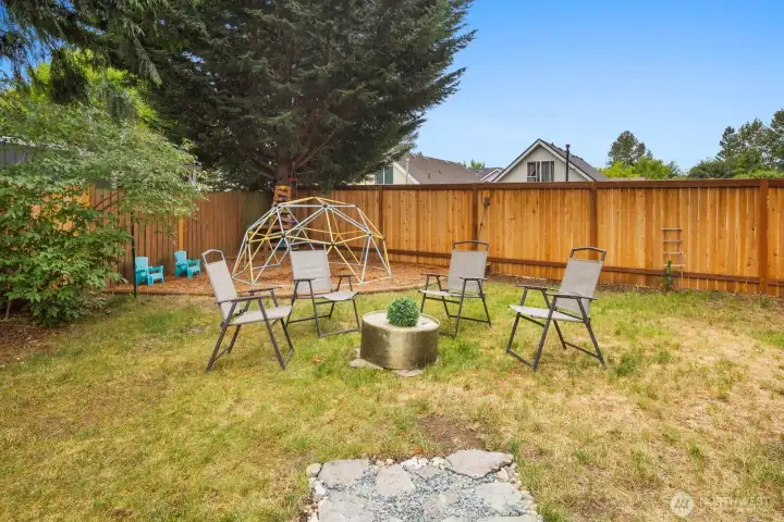 Cedar fence helps complete this partially fenced backyard to keep the kids and animals safe Cedar fence helps complete this partially fenced backyard to keep the kids and animals safe