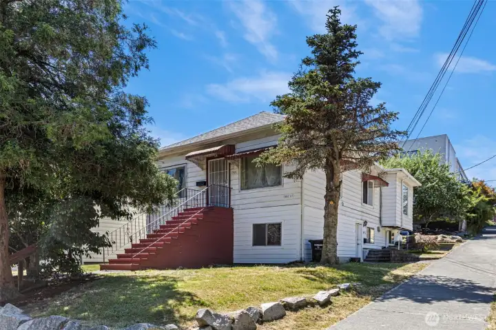 This Judkins Park duplex is in a great location with fun thing to do & it has light rail close by. On a corner lot at the end of a quiet dead-end street, it is surrounded by open space. This Judkins Park duplex is in a great location with fun thing to do & it has light rail close by. On a corner lot at the end of a quiet dead-end street, it is surrounded by open space.