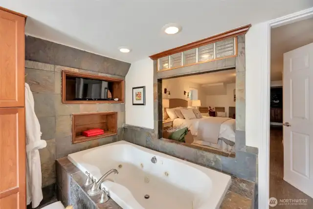 Lower level bedroom with soaking tub