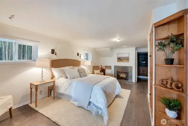 Lower level bedroom with gas fireplace