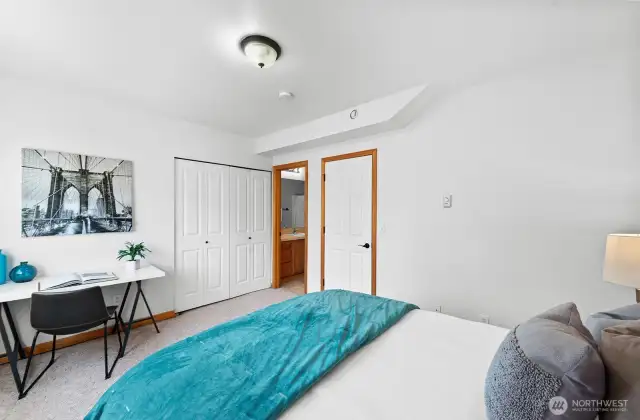 This bedroom has it's on bathroom.