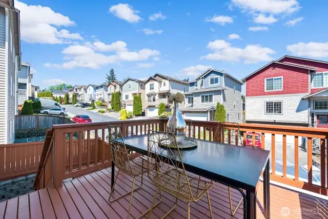 The deck off the kitchen is large enough for an outdoor seating area, BBQ, or container garden.