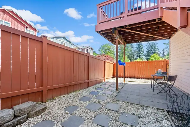 Fenced play area below.