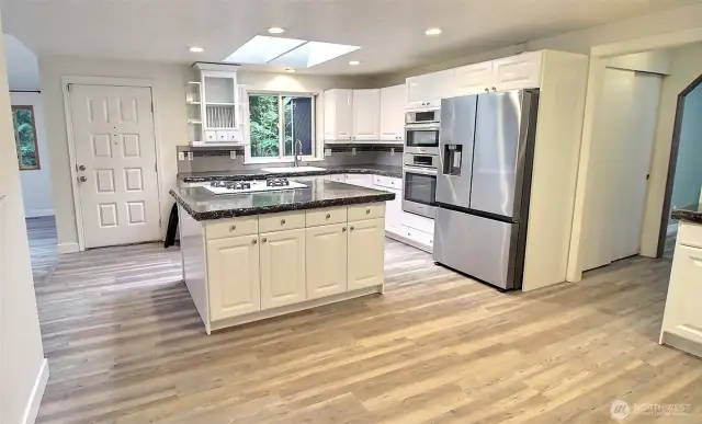 Another view of the Kitchen, note the extra cabinet space on this side of the island
