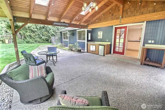 Ahhhh come relax in this exceptionally built covered patio, includes two stainless steel counters, a compact fridge, lighting, and dual heaters for those cozy fall days