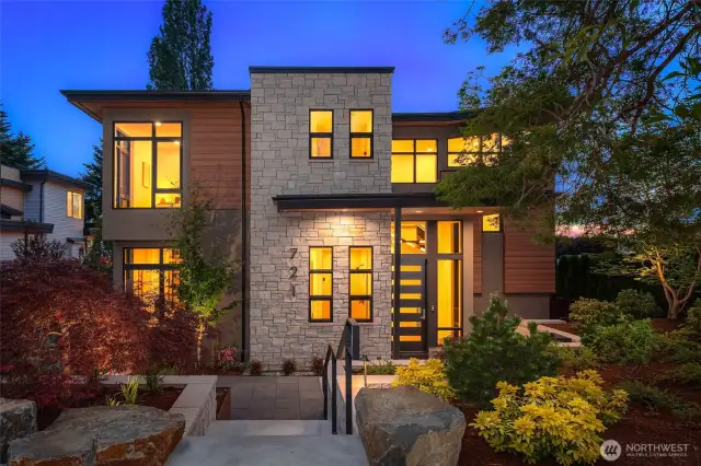 Stunning yet sophisticated NW Contemporary exterior. Low Maintenance Exterior Finishes Including Cement,Stucco with Elastomeric Finish, Natural Stone Veneer, TRESPA Siding and VG Stained Cedar Soffits
