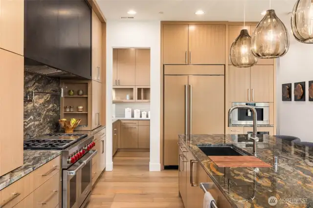 Custom Euro-Style Frameless Cabinets Throughout with Flush Rift Oak Doors