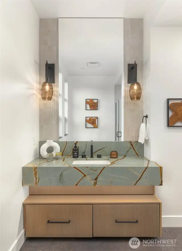Main Floor Guest Bath. Designer Selected Quartz and Natural Stone Slab Counters Throughout