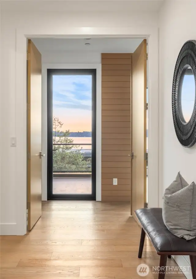 Dramatic Primary Bedroom Entrance through Solid Core Rift Oak French Doors