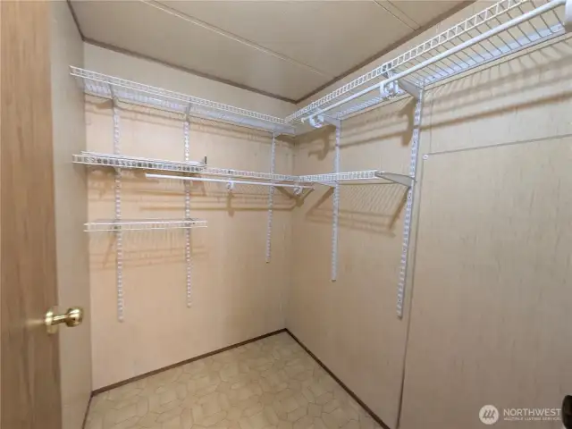 Primary walk-in closet.