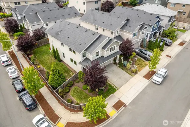 Aerial showing large corner lot.
