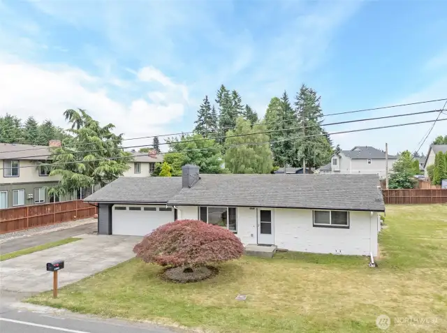 Beautifully updated property features  mature landscaping, and RV Parking!