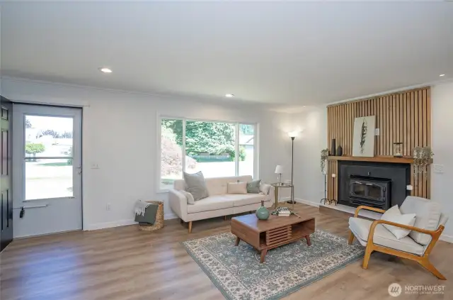 Beautifully updated luxury vinyl flooring meanders throughout the home!