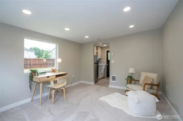 The studio offers a refrigerator, sink, and bathroom.