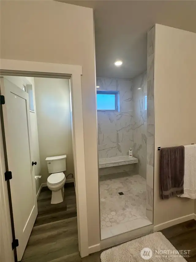 Water closet and dual shower
