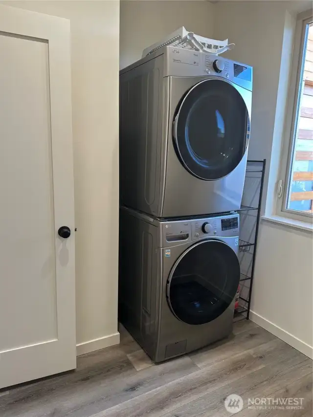 Separate laundry with washer and dryer