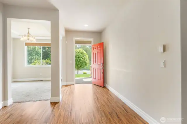 Entry and Dining Room or Office.  Beautiful Newer Laminate Floors