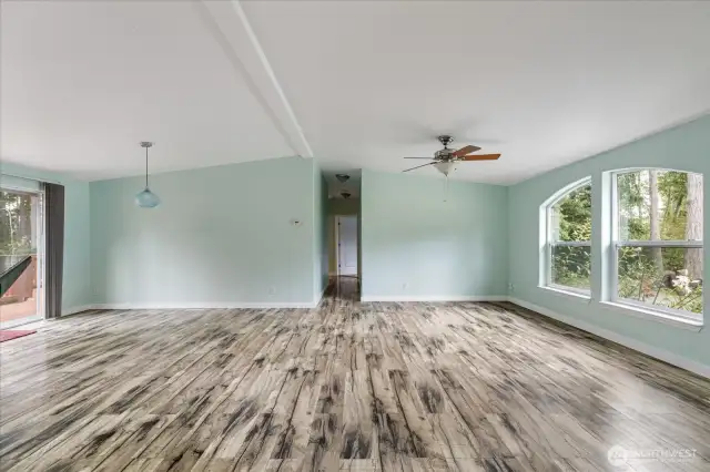 Living room looking down hall to the other 3 rooms and laundry room/back door.