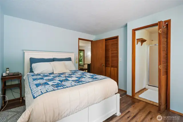 Primary with walk in closet and 3/4 bath