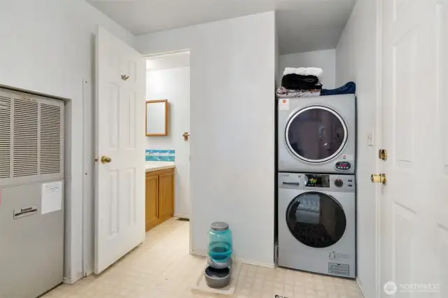 utility room with Half bath and new washer and dryer