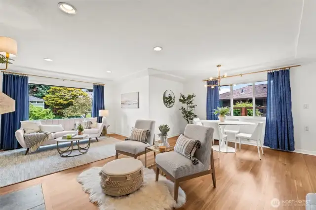 Large windows brighten the space with natural light, enhancing its open feel.