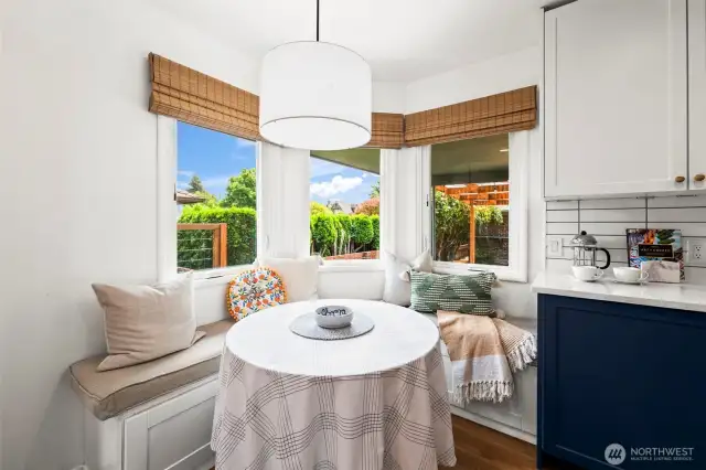 Don’t miss the charming built-in breakfast nook—a perfect spot for casual meals or morning coffee.