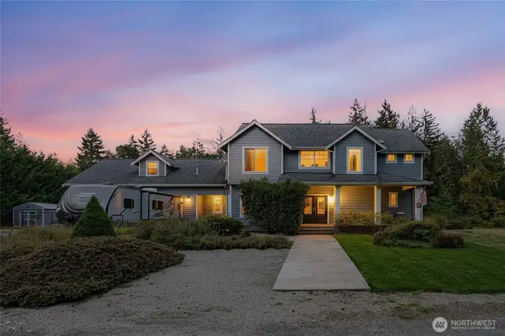 Front view of this stunning Craftsman-style home on nearly 22 acres.