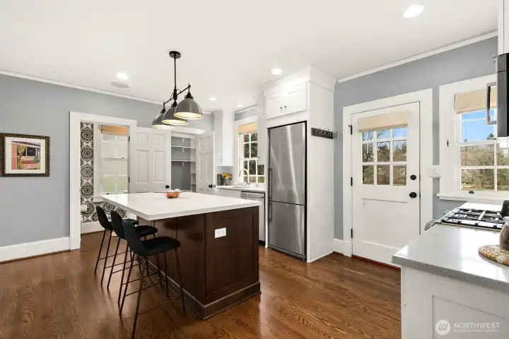 Powder on the main. Walk in pantry and fun kitchen island