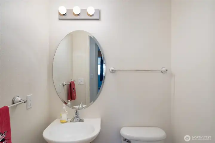 Hallway half bath.