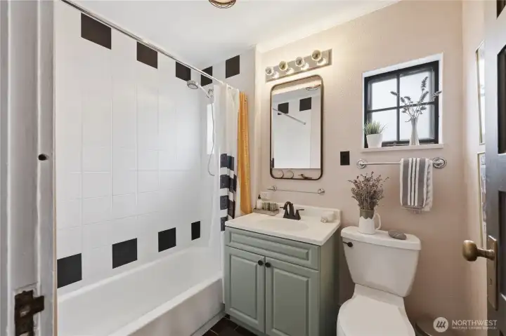 A lovely full bathroom on the main floor.
