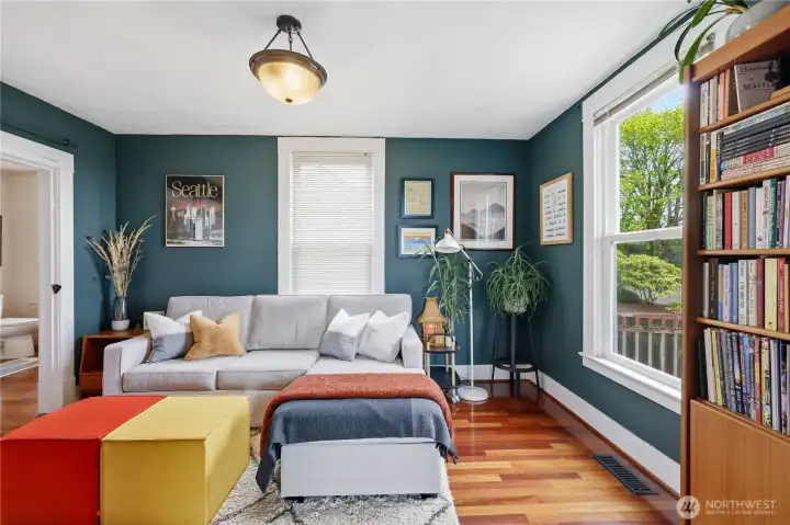 Off from the living room ia a primary bedroom currently used as a study/ guest room.