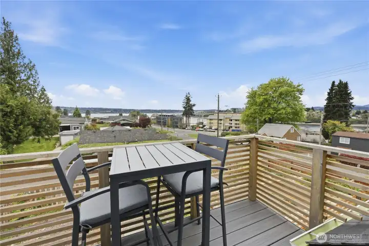 Out through the French doors is a perfect deck to sit and toast the day!