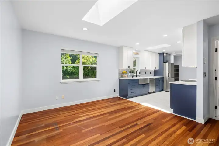 Hardwood floor continues throughout the dining area- with a skylight directly above your eating experience Hardwood floor continues throughout the dining area- with a skylight directly above your eating experience