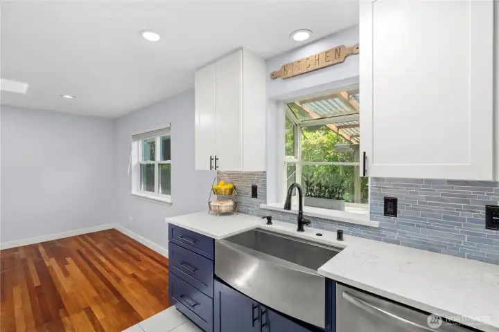 This kitchen lacks no natural light- skylight in addition to a bay window for your plants and herbs This kitchen lacks no natural light- skylight in addition to a bay window for your plants and herbs