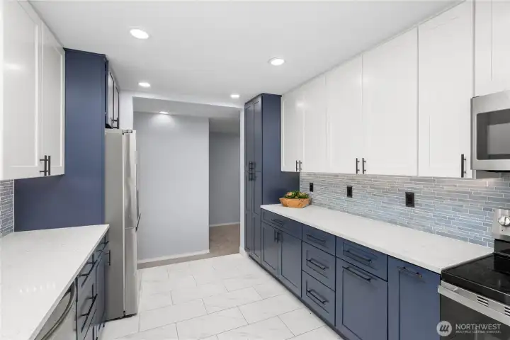 Walk through the kitchen to access- pantry, bonus rooms, laundry and outdoor access Walk through the kitchen to access- pantry, bonus rooms, laundry and outdoor access