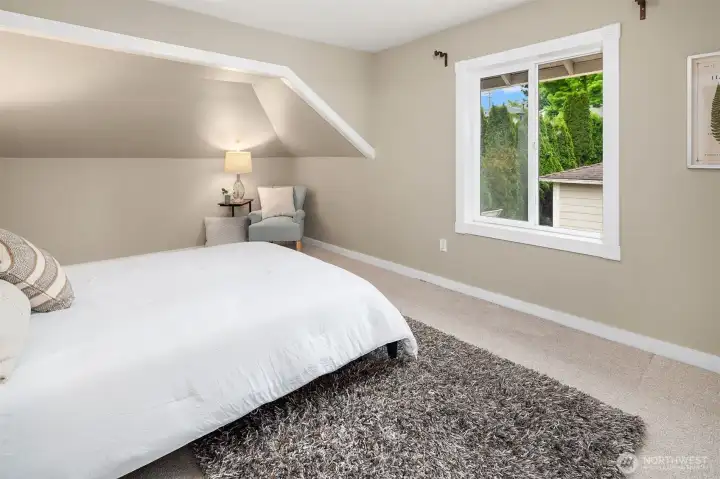 Primary Bedroom brings in natural lighting and so relaxing.