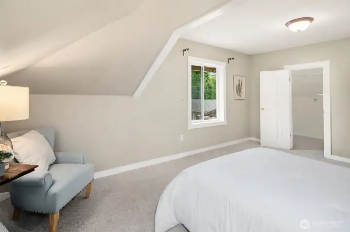 Primary Bedroom with a sitting area to read and relax.