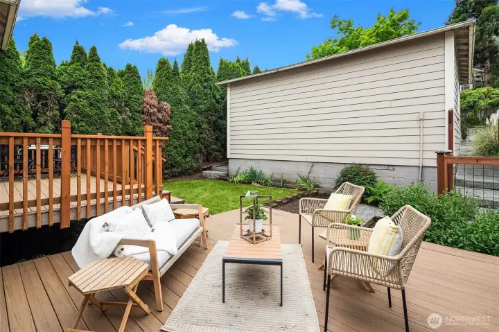 Lower Deck in the backyard and 2-car detached garage.
