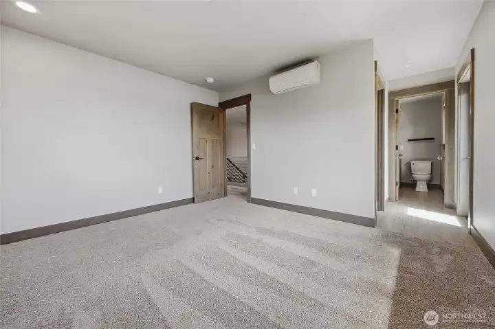 Bedroom + Ensuite bath, WIC, and Private balcony