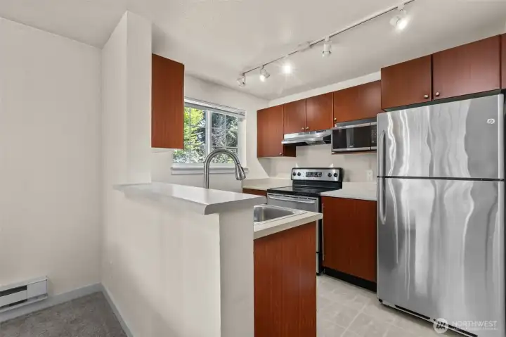 Virtually Staged kitchen with SS appliances included