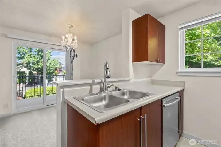 Virtually Staged kitchen facing breakfast/dining space