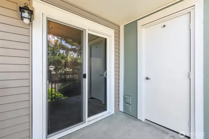 Virtually Staged view of storage unit off deck patio