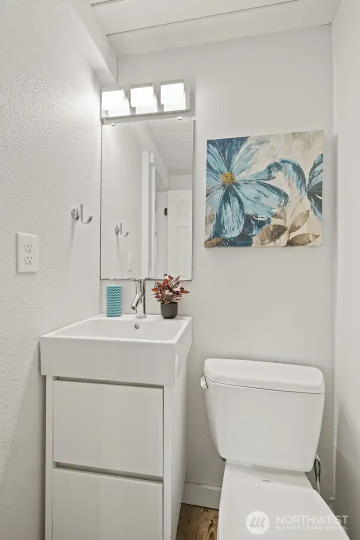 1/2 bath just off kitchen and family room 1/2 bath just off kitchen and family room